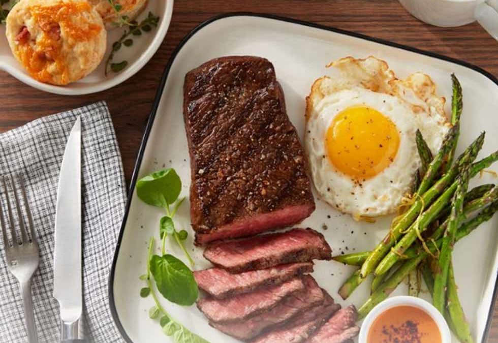Grilled Denver Steak with Sunny Side Up Egg, Asparagus Tips, Bacon Cheddar Biscuits, Peri Peri Dipping Sauce