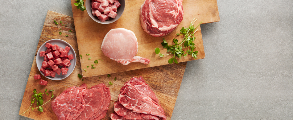 Various beef and pork portion cuts such as sliced and diced alongside whole cuts